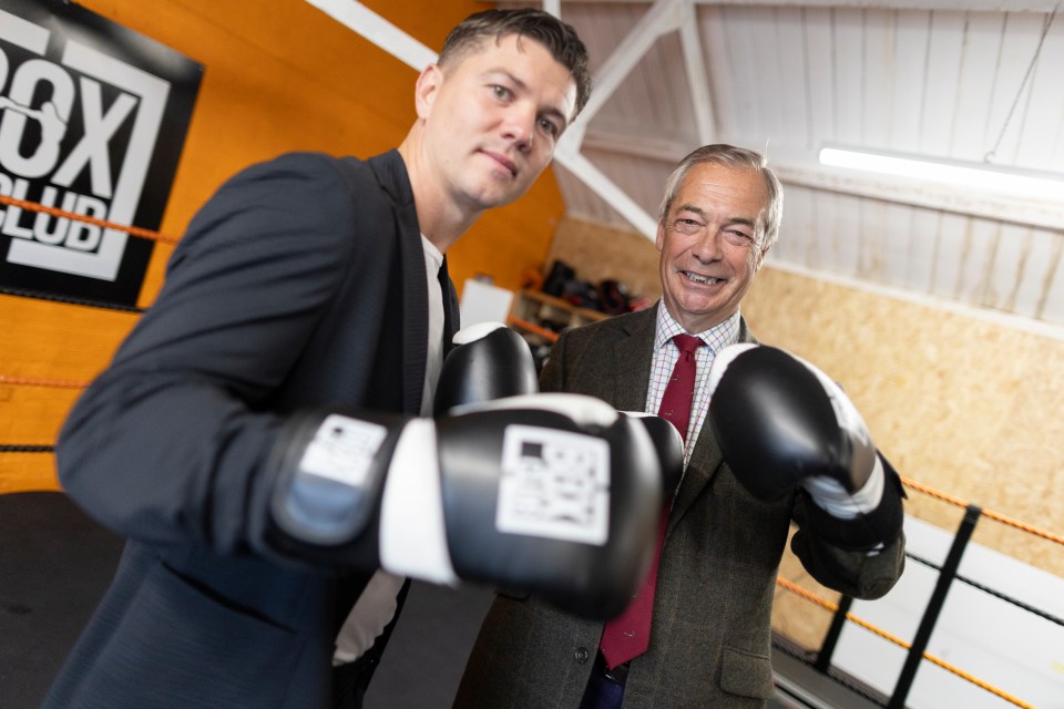 Nigel Farage and Luke Campbell wearing boxing gloves.