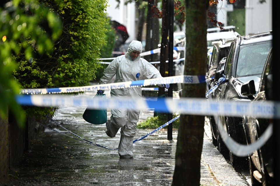 Forensic officer investigating a fire at the UK Prime Minister's home.