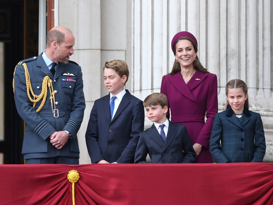 Prince William, Princess Catherine, and their three children on the Buckingham Palace balcony.