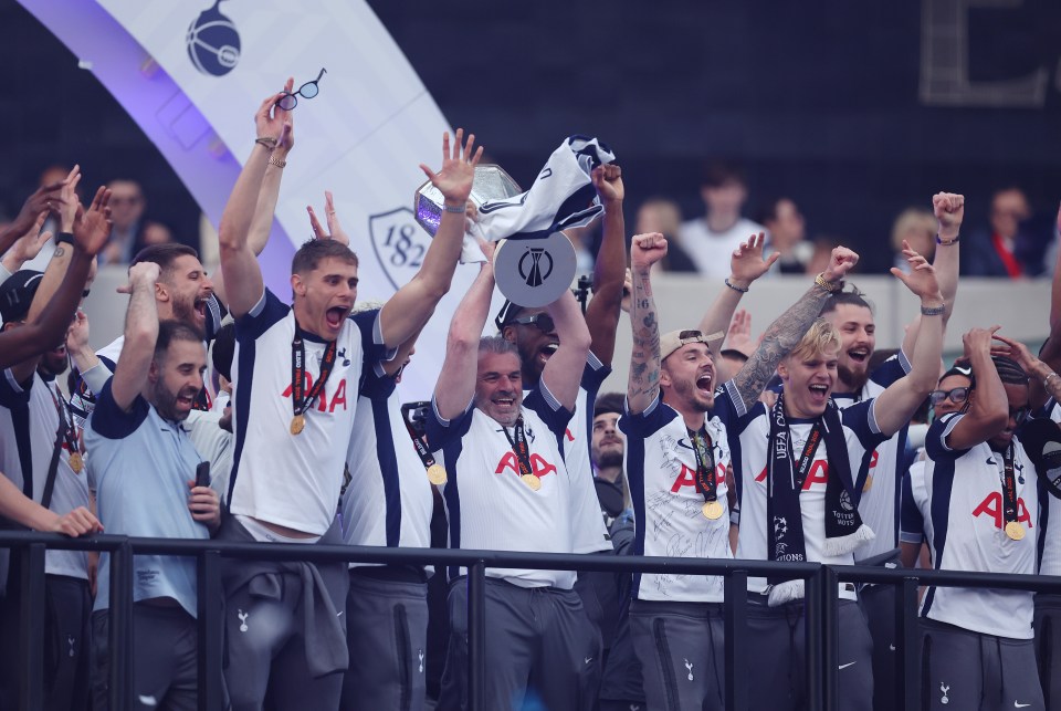 Tottenham Hotspur players celebrating their UEFA Europa League victory.
