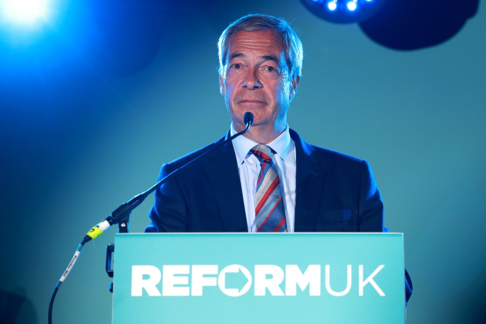 Nigel Farage speaking at a Reform UK event.