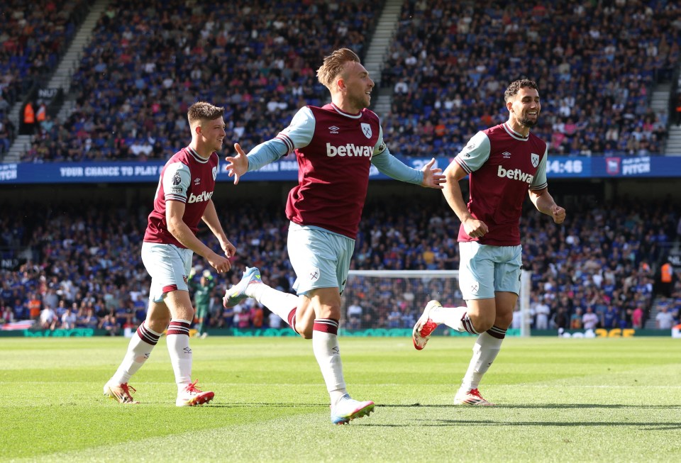 West Ham United players celebrating a goal.