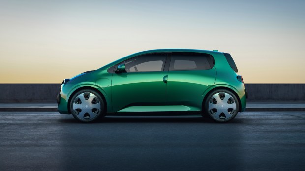 Side view of a green Renault Twingo E-Tech electric prototype.