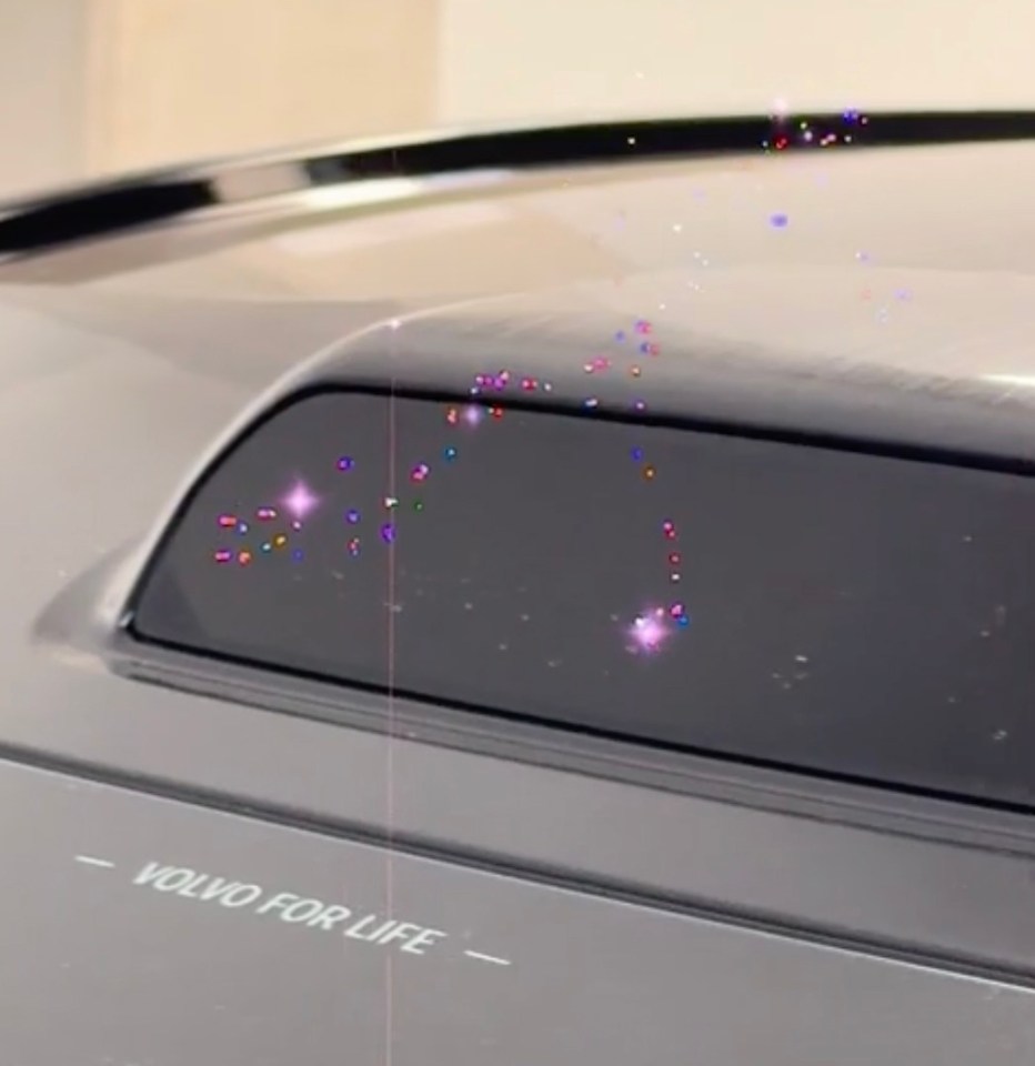 Volvo car with "Volvo for Life" text.