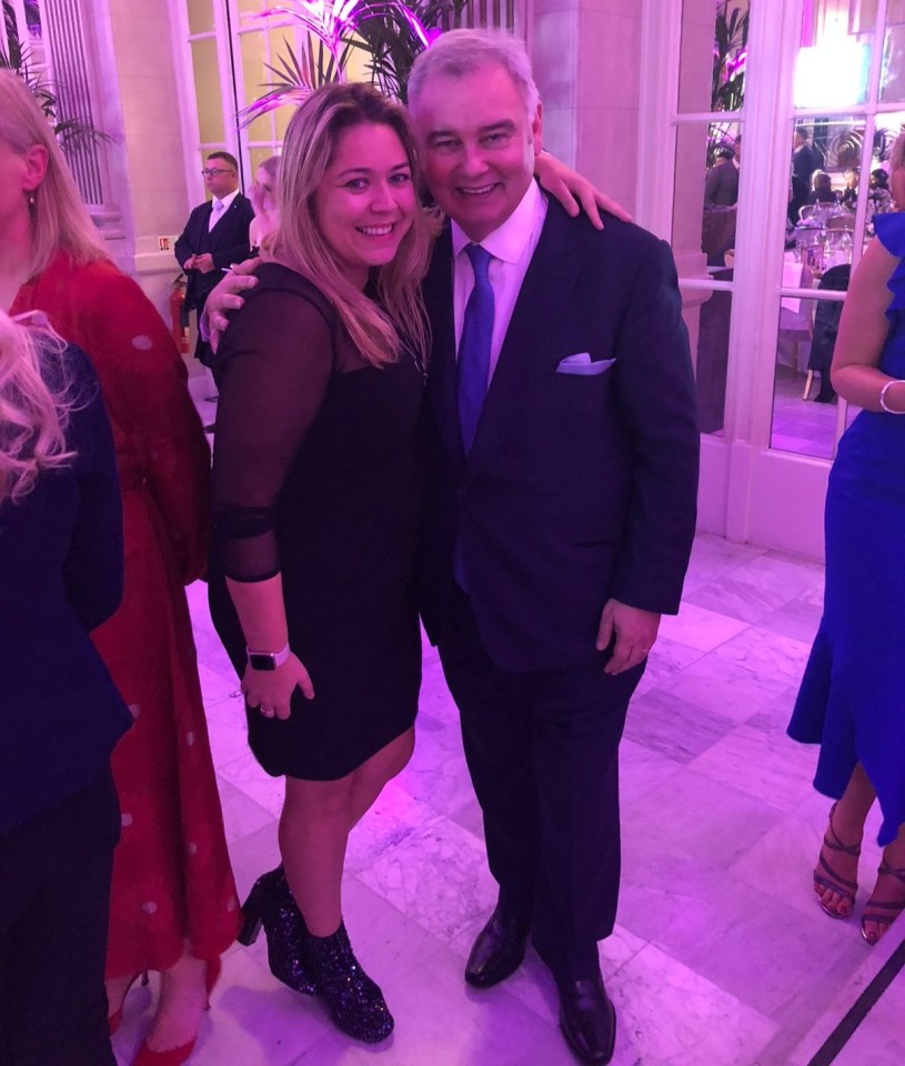 Photo of a woman and a man at an event.
