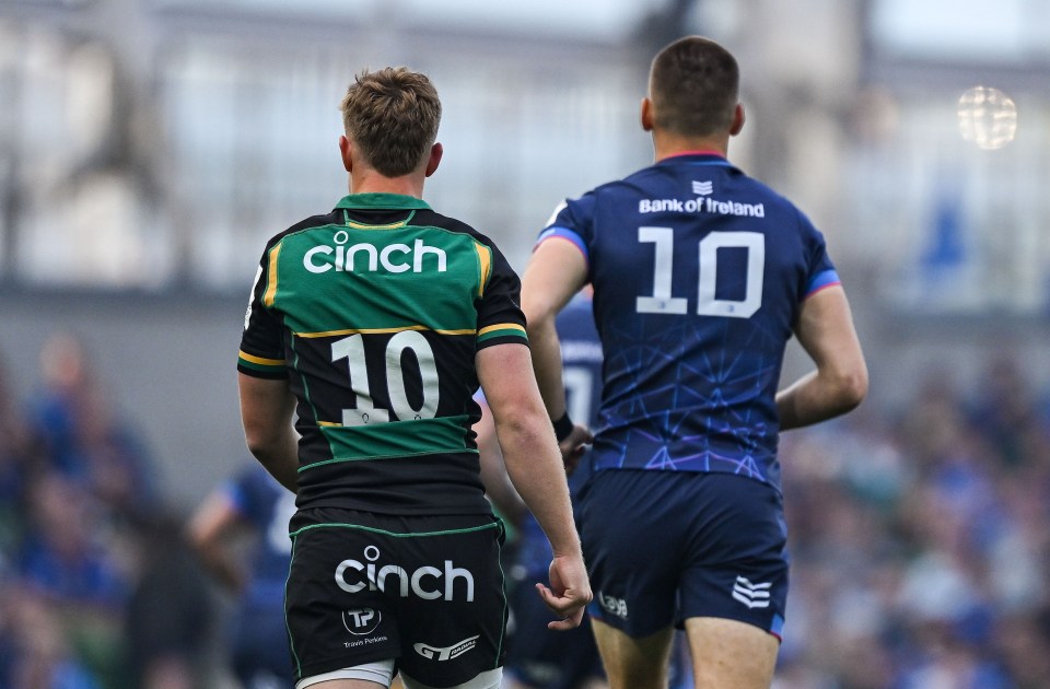 Photo of Sam Prendergast and Fin Smith during a rugby match.
