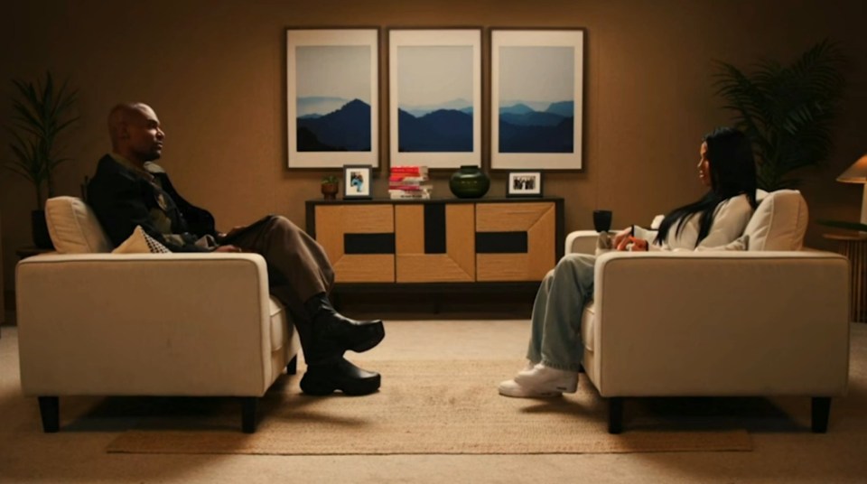 Screenshot of a YouTube video titled "We Need To Talk" showing two people sitting on armchairs facing each other.
