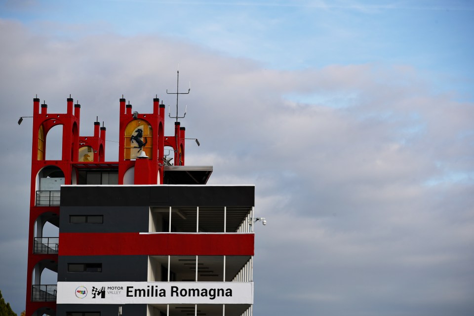 Autodromo Enzo e Dino Ferrari building with "Emilia Romagna" signage.