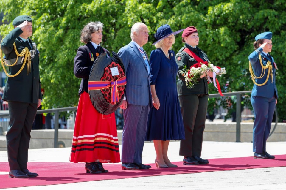 King Charles III and Queen Camilla lay a wreath at the National War Memorial in Ottawa.