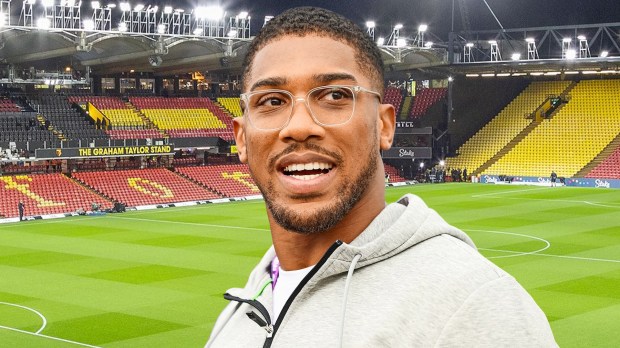 Joshua Buatsi in front of a stadium.