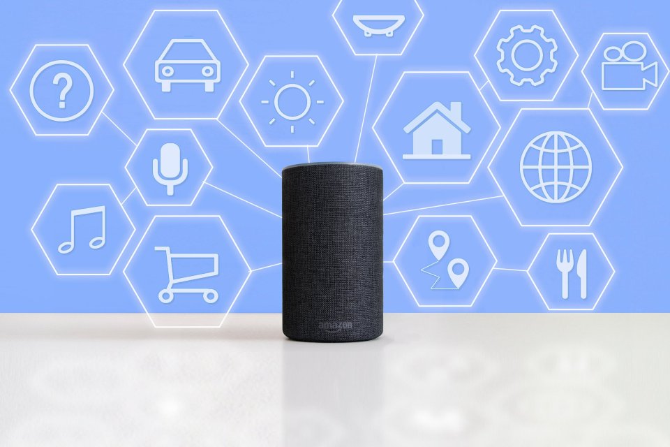 Alexa smart speaker with icons representing various smart home services.