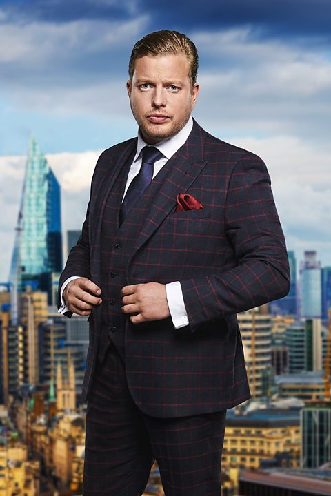 Tom Skinner in a suit, against a city backdrop.