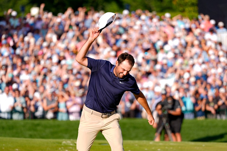 May 18, 2025; Charlotte, North Carolina, USA; Scottie Scheffler celebrates after winning the PGA Championship golf tournament at Quail Hollow. Mandatory Credit: Jim Dedmon-Imagn Images