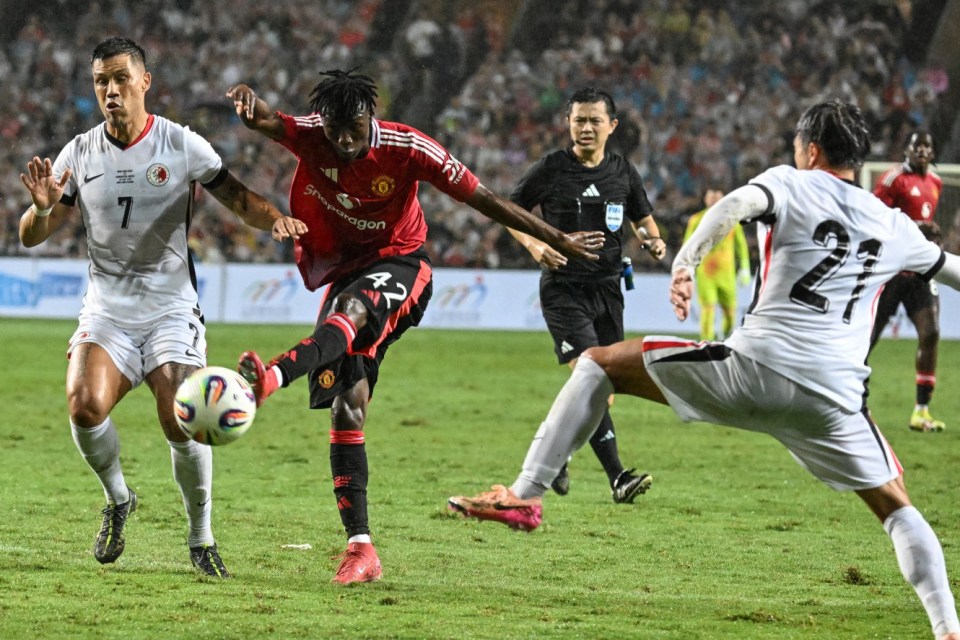 Manchester United's Sekou Kone (C) shoots on goal against Hong Kong during their friendly exhibition football match at the Hong Kong Stadium on May 30, 2025. (Photo by Peter PARKS / AFP) (Photo by PETER PARKS/AFP via Getty Images)