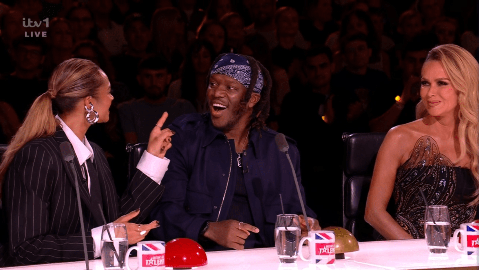 Screenshot of three judges at Britain's Got Talent laughing.