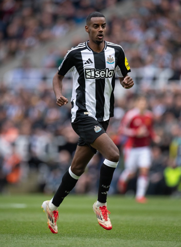 Alexander Isak of Newcastle United running during a soccer match.