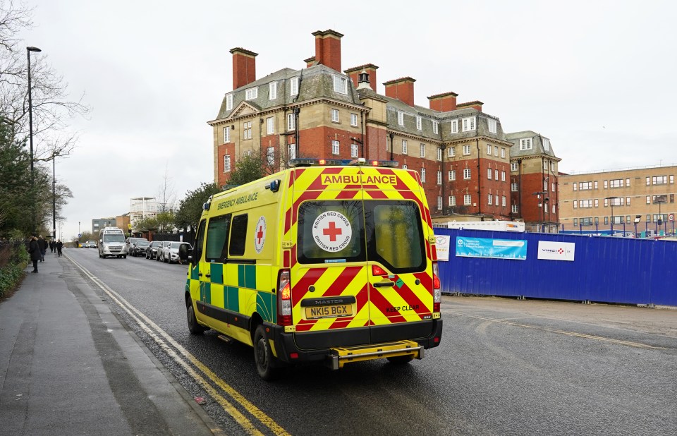 Ambulance parked outside a hospital.