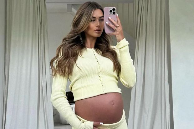 An image collage containing 1 images, Image 1 shows Pregnant woman in yellow outfit holding phone