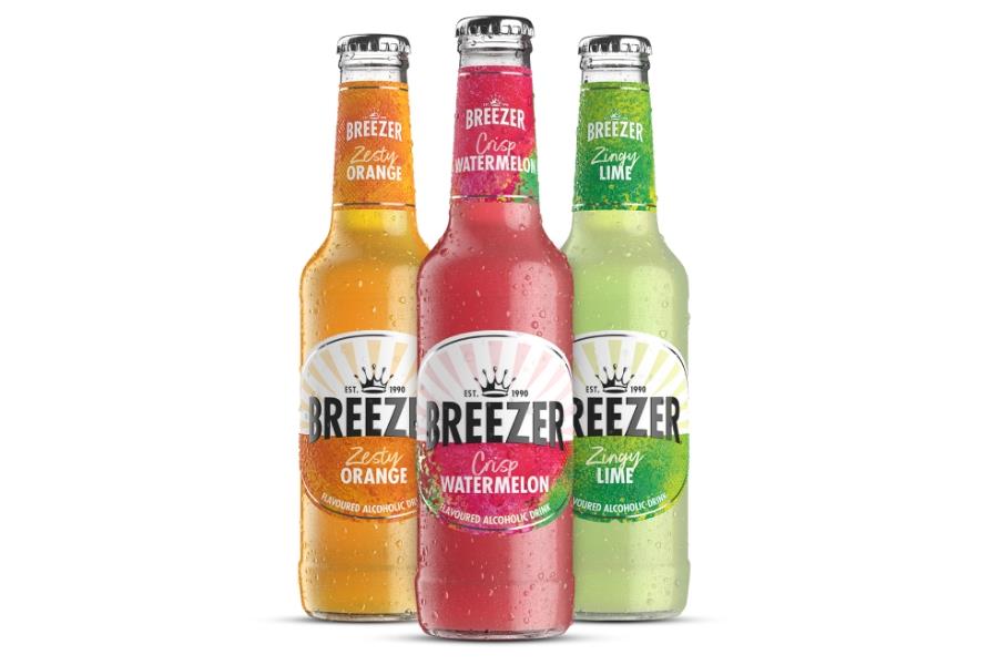 Three Breezer bottles: Zesty Orange, Crisp Watermelon, and Zingy Lime.