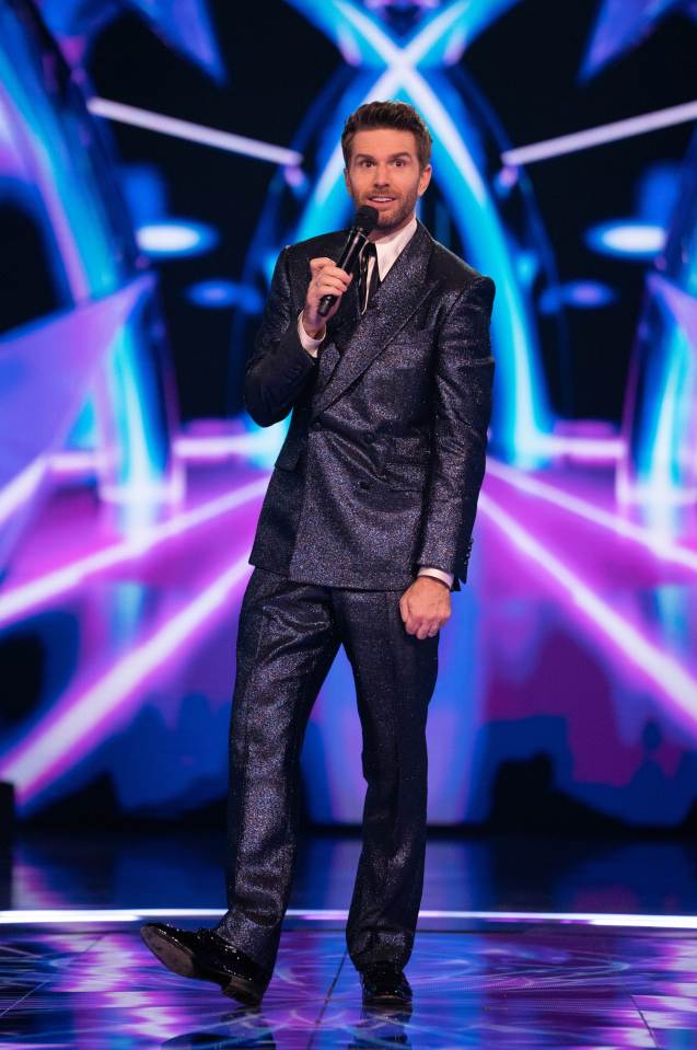 Joel Dommett on stage at The Masked Singer.