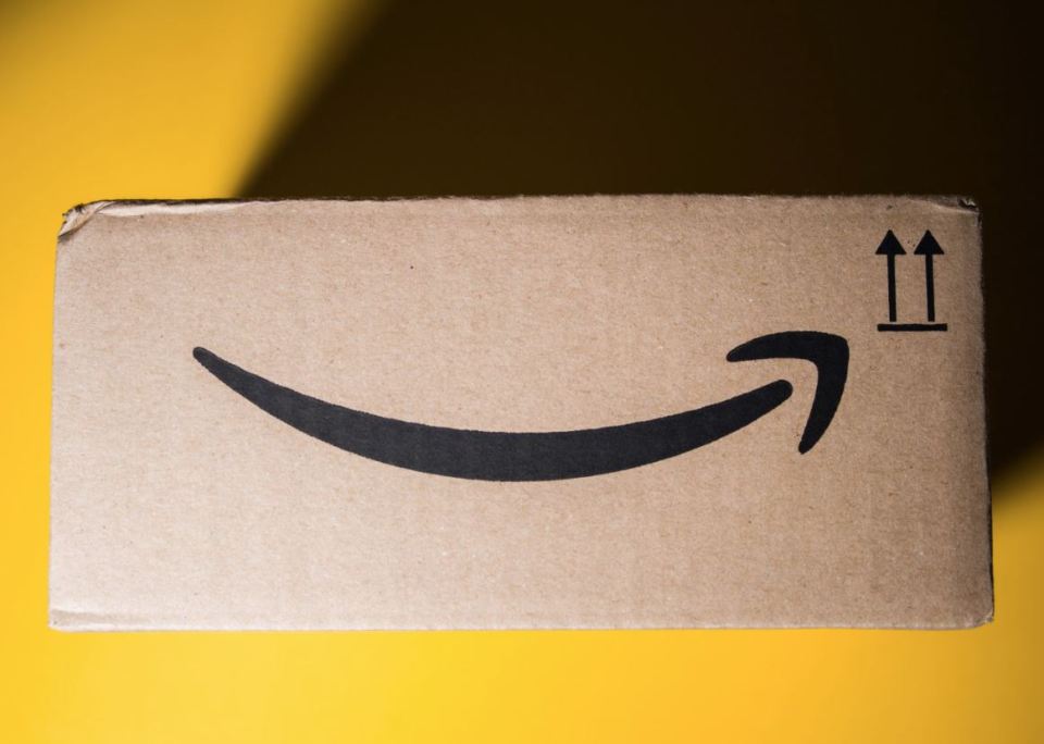 Amazon logo on a cardboard box.