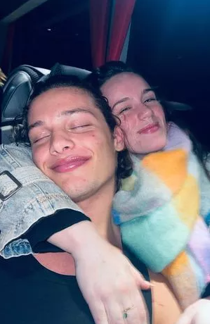 Bobby Brazier and Ellie Leach embracing.