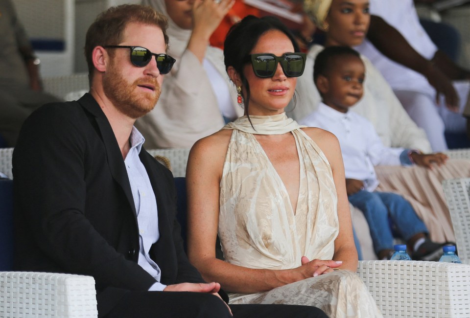 Prince Harry and Meghan Markle at a polo event.