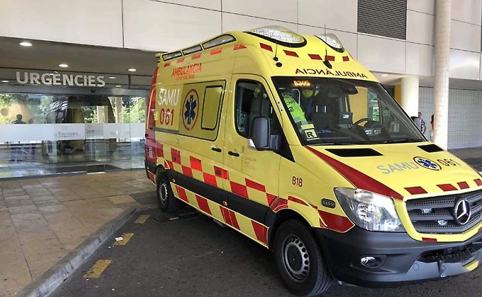 Ambulance parked outside a hospital.