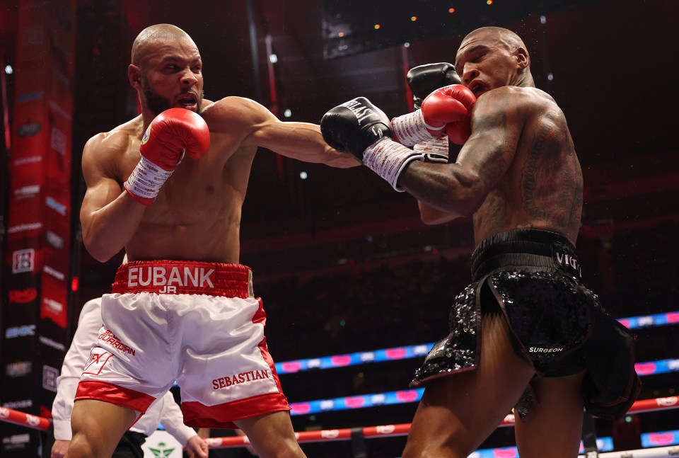 Chris Eubank Jr. (white shorts) boxing Conor Benn.