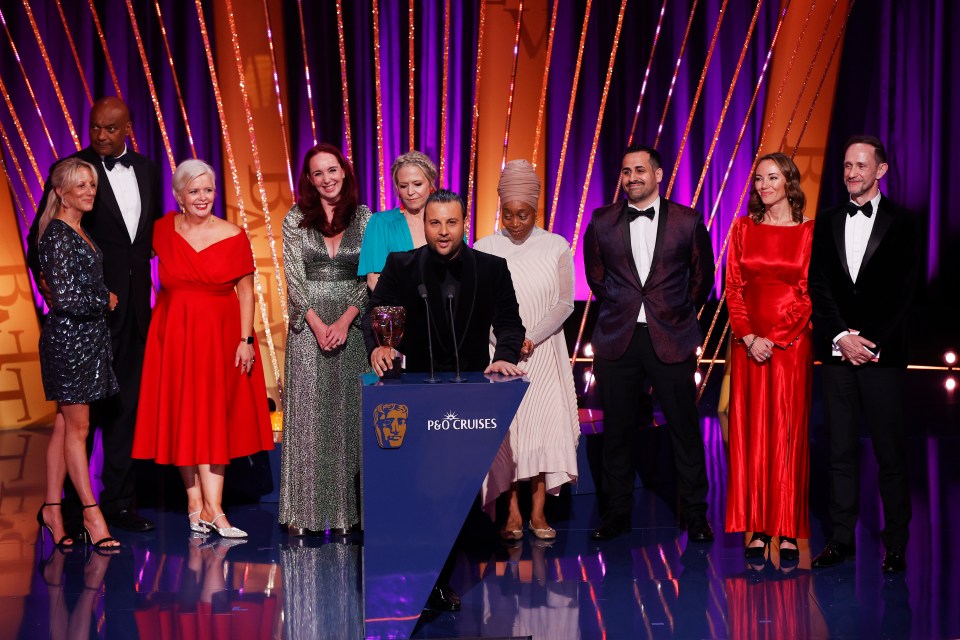 The EastEnders cast accepting a BAFTA Television Award.