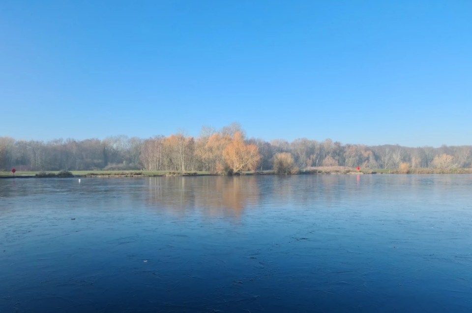 Frozen lake at Colwick Country Park.