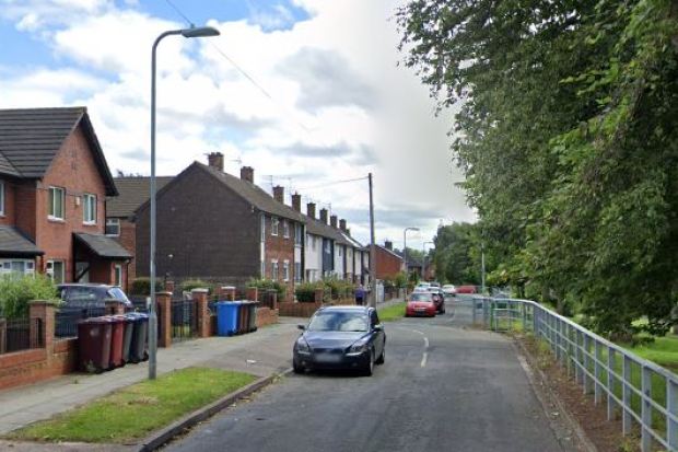 Street scene in Huyton following a stabbing incident.