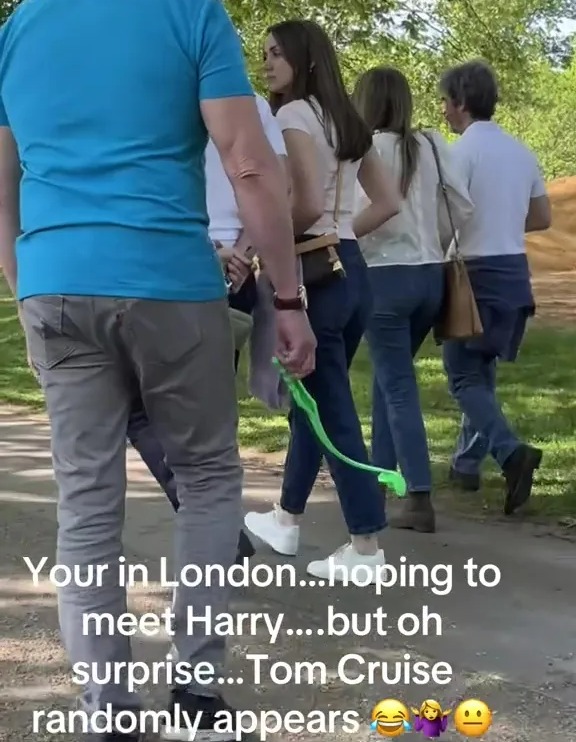 Onlookers react to Tom Cruise's surprise appearance in a London park.