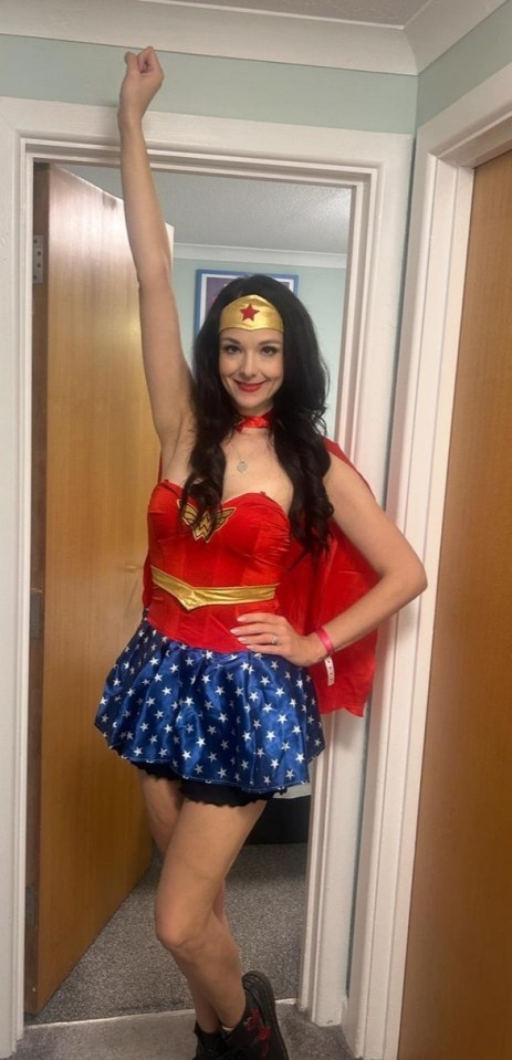 Woman dressed as Wonder Woman.