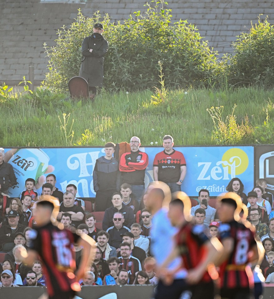 Shelbourne manager Damien Duff watching a soccer match.
