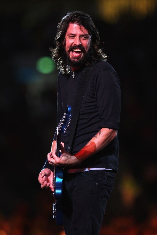 Dave Grohl of the Foo Fighters performing on stage.