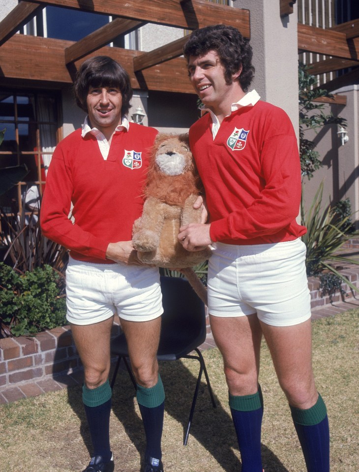 Ian McGeechan and Dick Milliken of the British Lions rugby team with a lion toy.