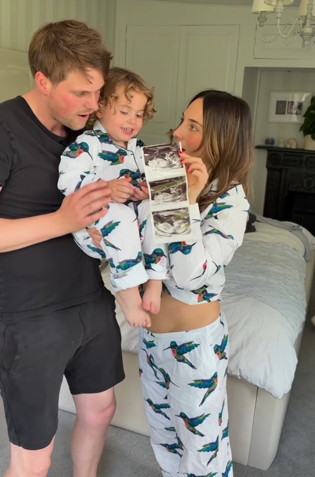 Family looking at ultrasound image.