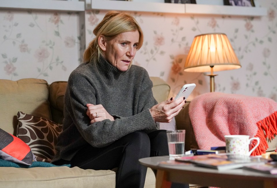 Woman looking at a smartphone.