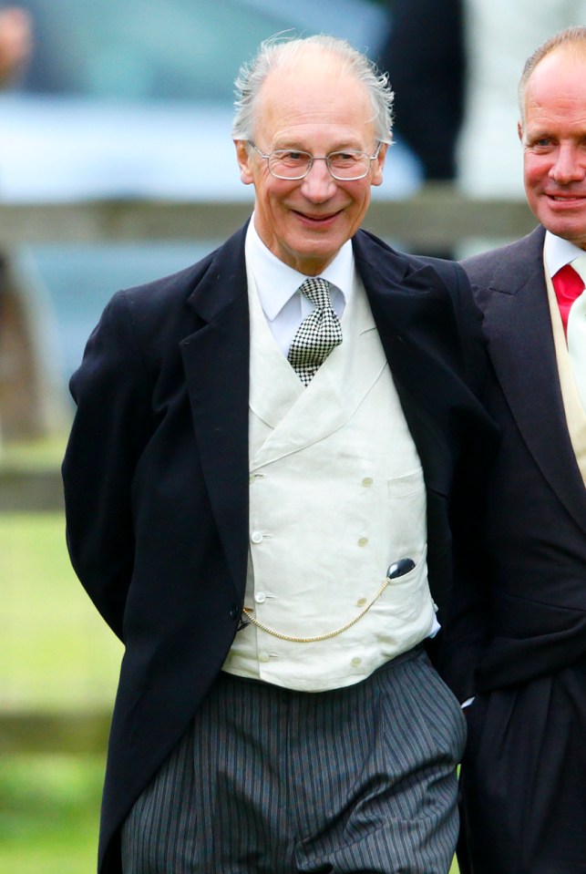 Baron Robert Fellowes at a wedding.