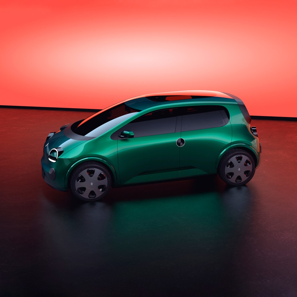 Side view of a green Renault Twingo E-Tech electric prototype.