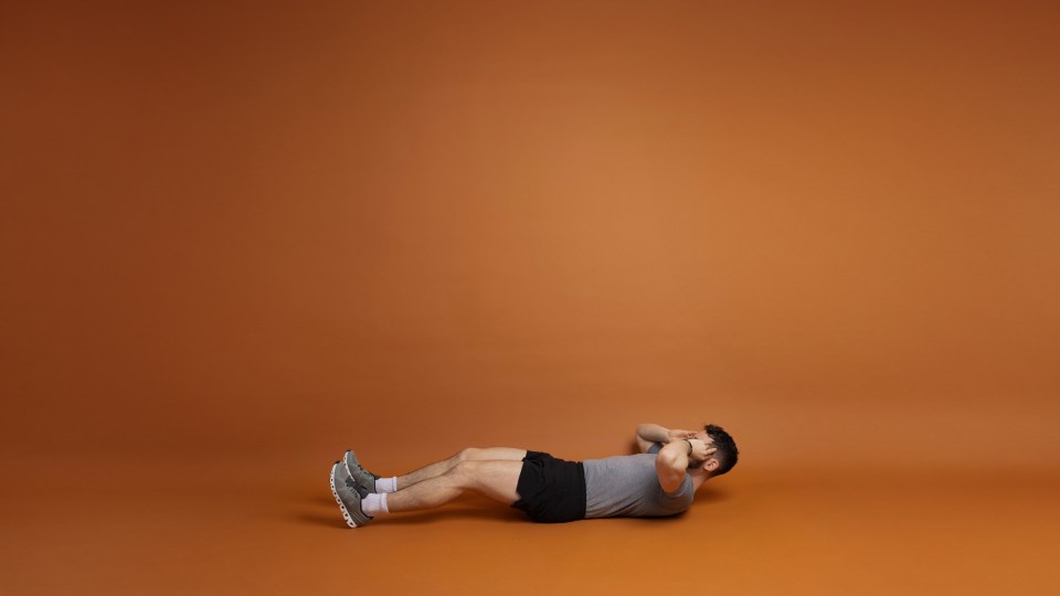 Man doing sit-ups.