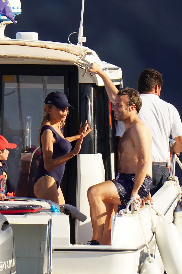 Emmanuel Macron and his wife Brigitte on a boat.