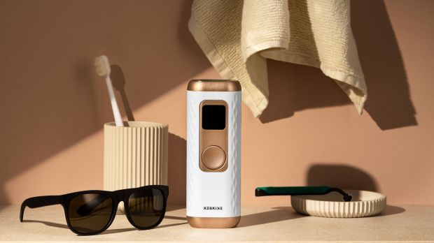 IPL hair removal device on bathroom counter.
