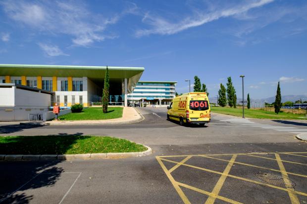 Ambulance parked outside a hospital.