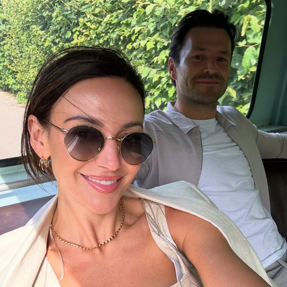 Michelle Keegan and Mark Wright in a car.