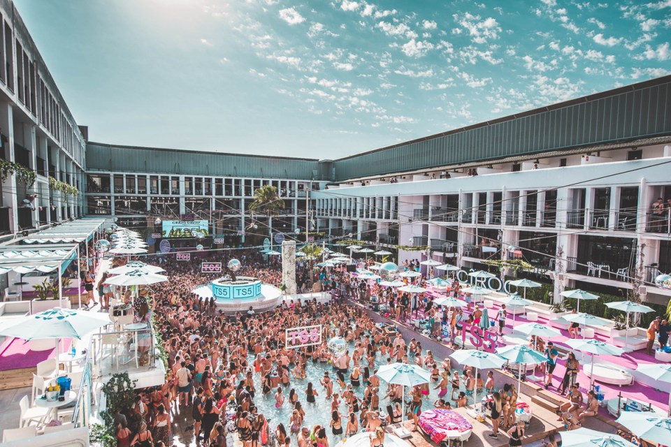 Aerial view of a crowded pool party at Ibiza Rocks.