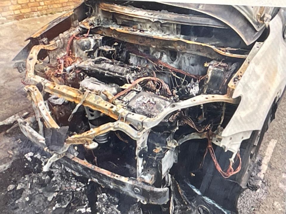 Burned-out car engine.