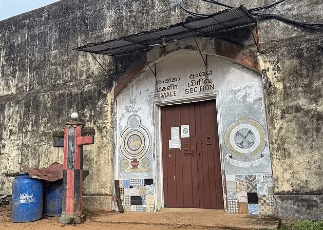 Entrance to the female section of a prison, with painted murals.