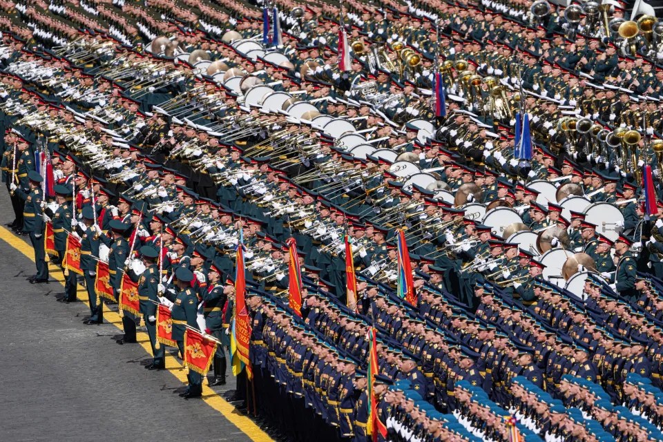 Military band and soldiers in formation.